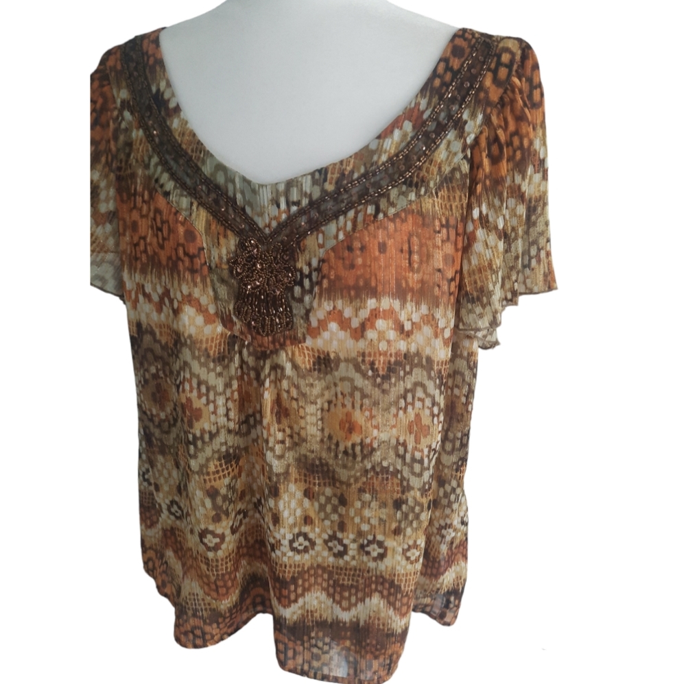 Dressbarn sheer top with polyester lining glitzy thread and sequins size…